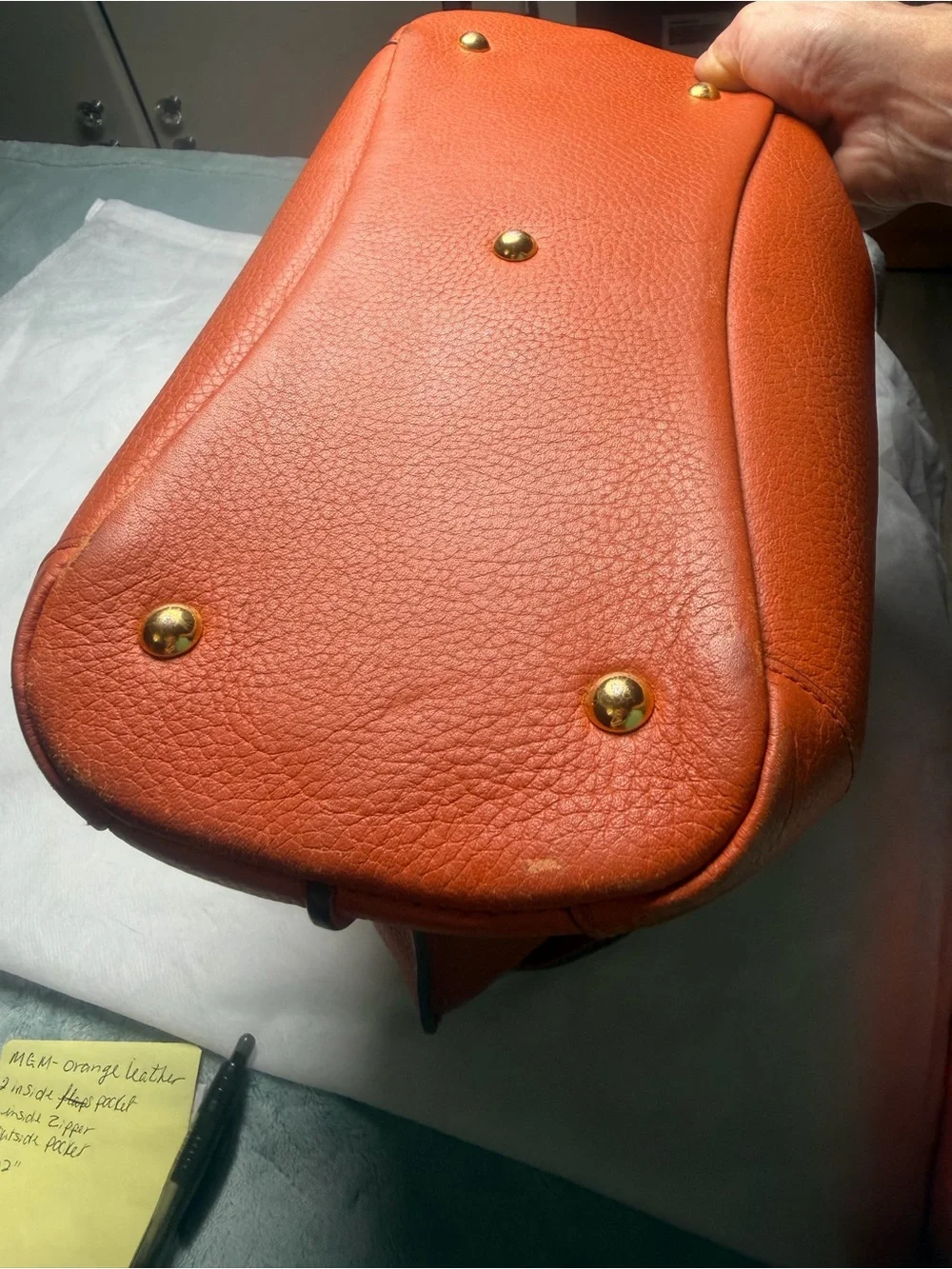 Structured Orange Leather Satchel with Top Handle and Crossbody Strap